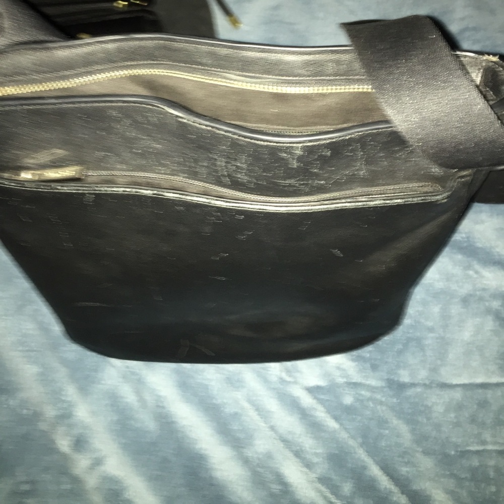 Black messenger style coach bag.